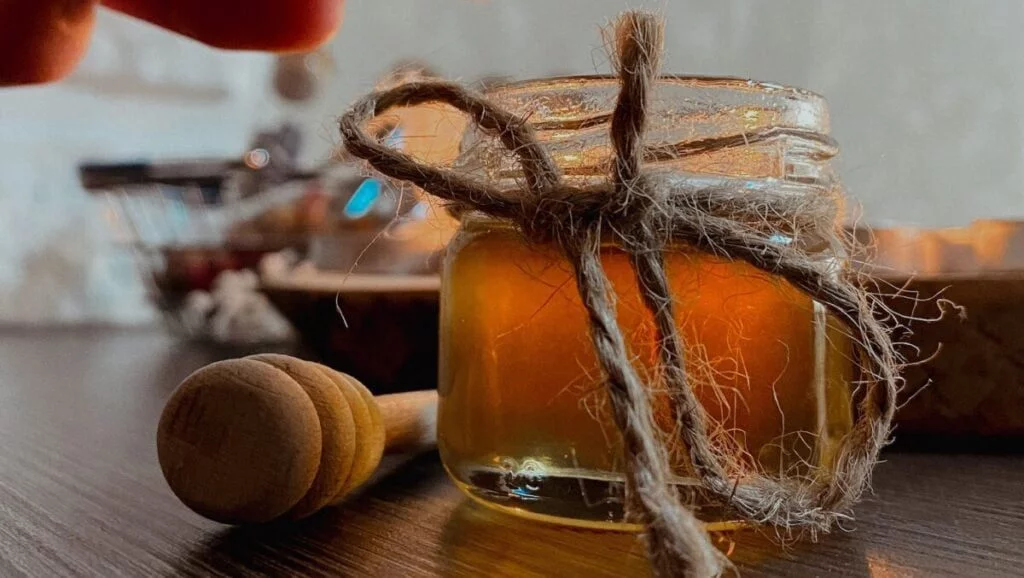 | Chill & Thrive a Person Opening a Jar of Honey good for sleep