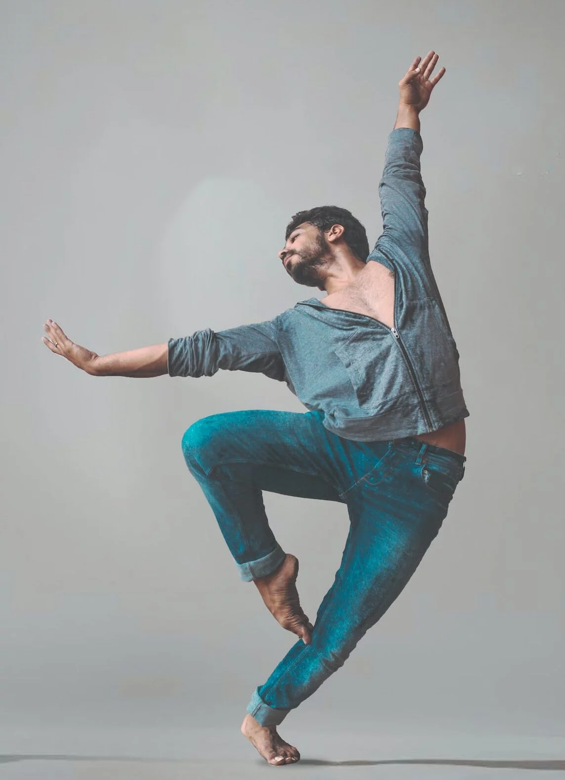 Photo by Yogendra Singh | Chill & Thrive Dancing Man Wearing Pants and Long-sleeved Shirt
