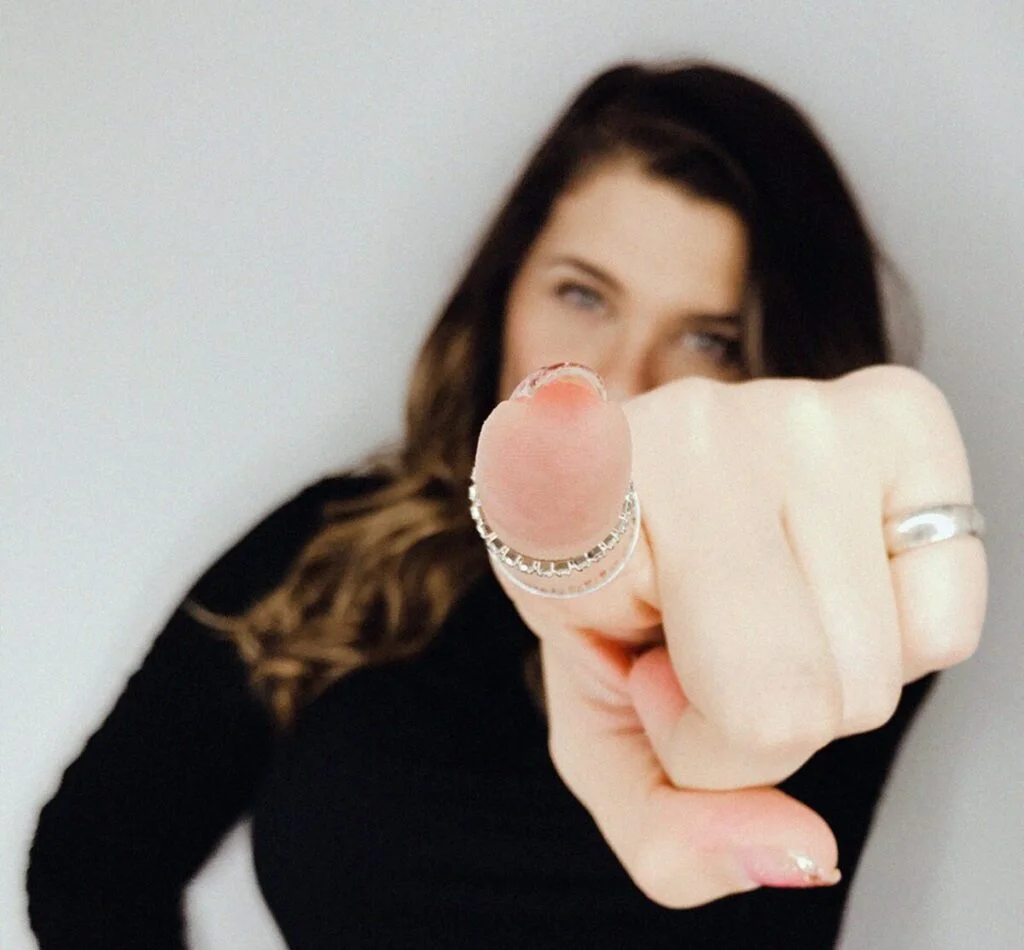 | Chill & Thrive a woment pointing a finger trying to make sb feel guilty