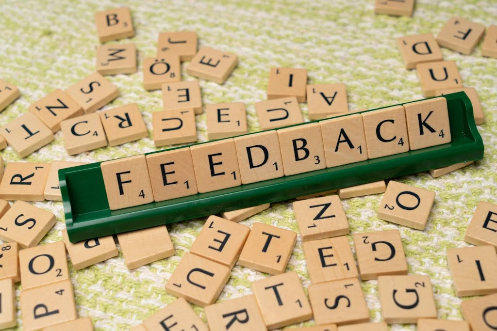 | Chill & Thrive The word feedback is spelled out with scrabble tiles